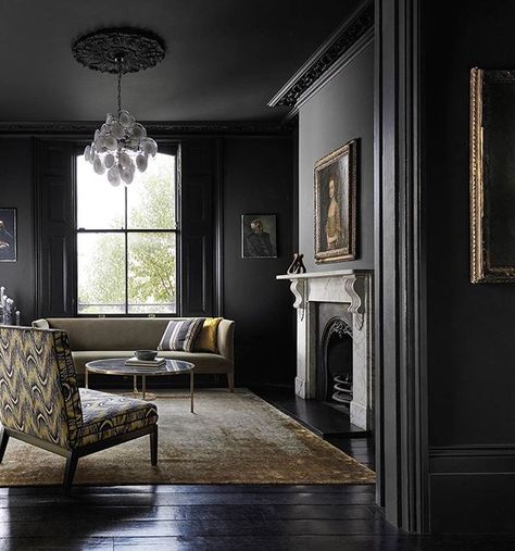 From @zoffanyfw's Alchemy of Colour Paint collection Vine Black creates a moody luxurious look intertwining soot black with tonal blues. Paint your walls and ceiling the same colour for an infinity effect. #alchemyofcolour #zoffanypaint #paint #black #colour #decorate #interiordesign #homestyle #homedesign #luxurydesign Dark Academia Living Room, Dark Academia Bedroom, Academia Bedroom, Zoffany Paint, Dark Living Rooms, Dark Walls, Black Ceiling, Dark Interiors, Black Walls