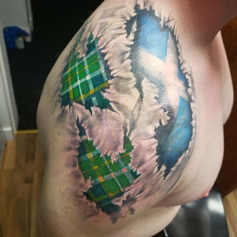 Scotland flag and Irish national tartan ripped skin shoulder tattoo Ripped Skin Tattoo, Scotland Flag, Irish Tartan, Men Tattoo, Shoulder Tattoo, Tattoos For Guys, Watercolor Tattoo, Tartan, Scotland