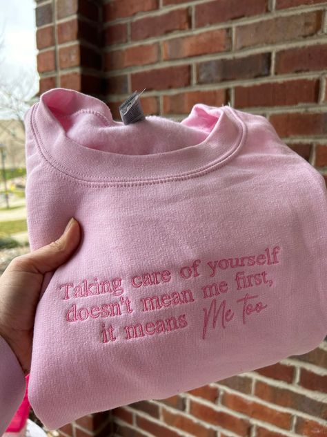 Our mental health awareness line is perfect for the New Year as a daily reminder to take care of yourself first.  Embroidered on soft pink  color sweatshirt with pink thread. DETAILS: 8 oz./yd² (US) 13.3 oz./L yd (CA), 50/50 cotton/polyester, 20 singles 2-end midweight fleece fabric Classic fit Air jet yarn for softer feel and reduced pilling Double-needle stitching at shoulders, armholes, neck, waistband and cuffs 1x1 rib with spandex for enhanced stretch and recovery Tear away label *please note all of our embroidered items  come with a backing to support the stitches.  If you would like another color sweatshirt or thread color please message us! Ortho Assistant, Mental Load, Self Love Self Care, Embroidered Items, Sweatshirt Embroidery, Color Sweatshirt, Pink Thread, Buy Hoodies, Soft Pink Color