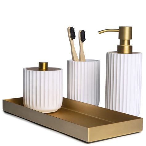 PRICES MAY VARY. Nullify Handcrafted from Finely Sculpted Resin & Stainless Steel - Our 4 piece bathroom decor sets accessories are designed to add a uniquely modern traditional appeal and infuse effortless style into your space design. Exceptional Quality & Style - Our White & Gold Collection feature a ribbed texture with antique brass accents. Made with high-quality resin and rust-proof stainless steel, our collection is durable and long-lasting. The pump of the soap dispenser is sturdy and ea White Bathroom Accessories Set, Soap Dispenser Set, White Bathroom Accessories, Gold Bathroom Accessories, Boho Bathroom Decor, Bathroom Decor Sets, Bathroom Accessories Sets, Gold Bathroom, Boho Bathroom