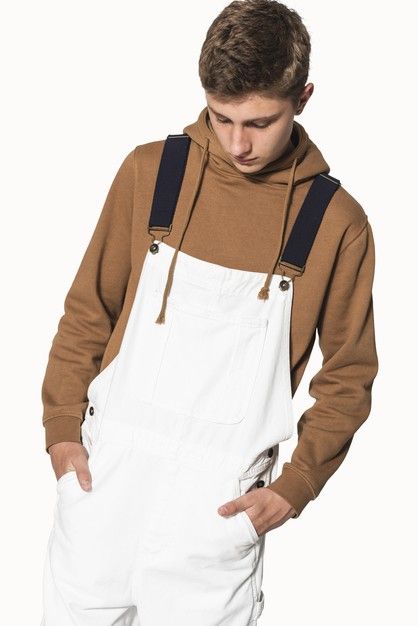 Teenage boy in white dungarees and brown... | Free Photo #Freepik #freephoto #man #clothes #person #boy Cute Dungarees, Overalls Boy, White Dungarees, Streetwear Photoshoot, Apparel Mockup, Brown Hoodie, Hoodie Streetwear, Presents For Girls, Sandy Liang