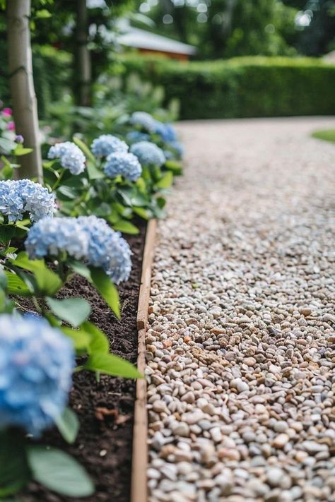 Gravel Driveway Wood Border Ideas for Your Home River Rock Driveway, Driveway Garden Border, Gravel Edging, Gravel Driveway Ideas, Landscape Gravel Driveway, Gravel Driveway Stone Edging, Beautiful Gravel Driveway, Gravel Driveway Turnaround Ideas, Edging Gravel Driveway