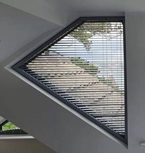 Venetian blind in a contemporary triangular window #awkwardwindows Odd Shaped Window Blinds, Blinds For Triangular Windows, Triangular Window Coverings, Triangle Window Coverings, Triangular Windows, Circular Windows, Yacht Ideas, Triangle Window, Bedroom Shades