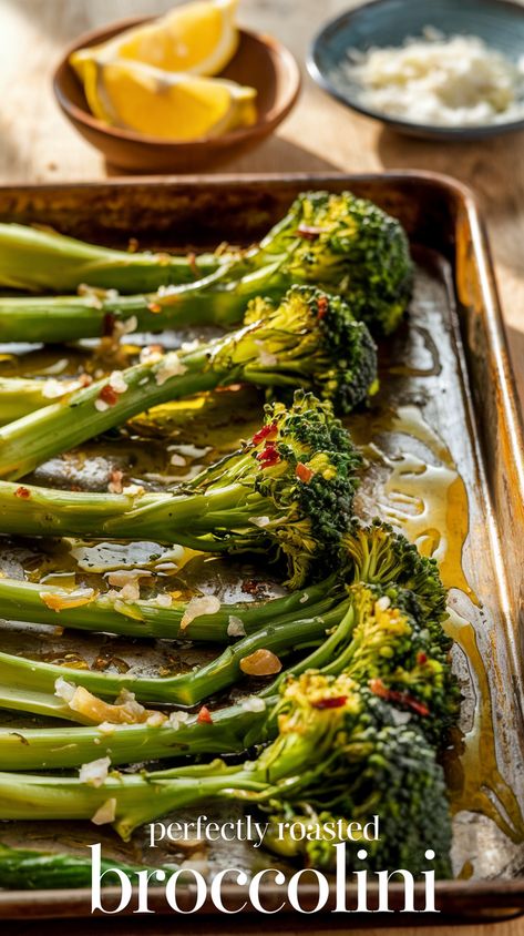 Perfectly roasted broccolini on rustic baking sheet with olive oil, sea salt, garlic, red pepper flakes, lemon wedges, and Parmesan in the background. Broccolini Recipes Roasted, Best Broccolini Recipes, Oven Roasted Broccolini Recipe, Brocolini Recipes Oven, Cooking Broccolini, How To Cook Broccolini Easy Recipes, Broccolini Recipe Sauteed, Broccolini And Carrots, Broccolini Recipe Side Dishes