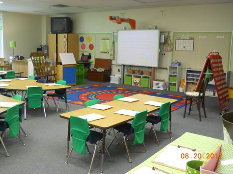 Target book cover seat covers and neat desk arrangement, Under Smartboard Storage, Desk Arrangement, Cozy Classroom, Classroom Seating Arrangements, Neat Desk, Desk Arrangements, Classroom Seating, Job 3, Classroom Furniture