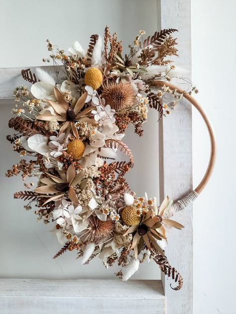 Dried flower wreaths offer a unique way to bring nature indoors and enliven a space with floral decor. As lasting floral art pieces, dried flower wreaths celebrate a love of nature and can be used to highlight the changing seasons. They also make meaningful one-of-a-kind gifts for someone special and suitable for any o Dried Floral Wreaths, Dried Flower Wreath, Dried Wreath, Billy Buttons, Bring Nature Indoors, Boho Wedding Flowers, Flower Wreaths, Dried Florals, Dried Flower Wreaths