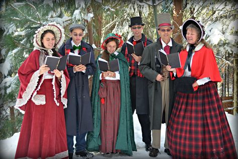 Christmas caroling in 1850's Dickens costumes. Dickens Costumes, The Ghost Of Christmas Past, Dickens Christmas Carol, Scrooge Christmas, Charles Dickens Christmas, Christmas Caroling, Ghost Of Christmas Past, Ebenezer Scrooge, Classic Christmas Movies