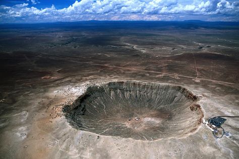 Meteor Crater, Arizona. About 50,000 years ago a meteor hit the Earth 40 miles East of Flagstaff and left a 1 mile-across and 600 feet-deep crater.  I've been there, and I can attest: that is one huge gaping dent in the ground. Crater Arizona, Sedona Hotels, Meteor Crater, Meteor Impact, Impact Crater, Aerial Photograph, Utah Photography, Samos, Flagstaff