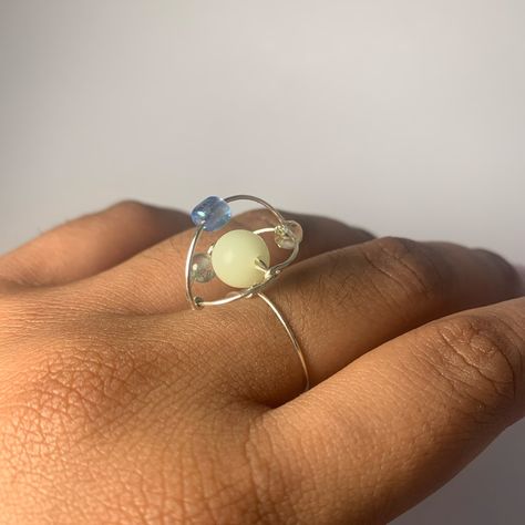 Fidget Saturn Ring (Centre bead glows in dark) $35.00 Personally, this is the coolest ring I’ve made so far! #earrings #smallbusiness #smallbusinessowner #smallbusinesssupport #supportsmallbusiness #smallbiz #earring #trinidad #trinidadandtobago🇹🇹 #trini #trinidadandtobago #princess #handmade #handcrafted Saturn Ring, Support Small Business, Trinidad, Glow In The Dark, Handmade Jewelry, Beads, Ring, Quick Saves, Design