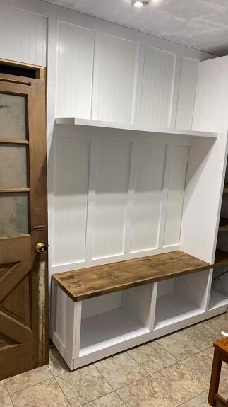 This entry used to be a truly cluttered mess. So we did a complete DIY mudroom makeover! Our mudroom makeover was so much fun and easier than we thought. Bead Board Mudroom, Beadboard Mudroom, Diy Mudroom Wall, Whitewash Paint, Fake Brick, Beadboard Paneling, Mudroom Makeover, Royal Design Studio Stencil, Diy Mudroom