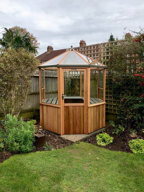 Alton Octagonal 6x6 Greenhouse Installation in Horsham West Sussex | Cousins Conservatories & Garden Buildings Corner Greenhouse Ideas, Small Corner Greenhouse, Hexagon Conservatory Ideas, Corner Greenhouse, 6x6 Greenhouse, Octagon House Exterior, Octagon Greenhouse, Octagonal Greenhouse, Octagonal Building Architecture