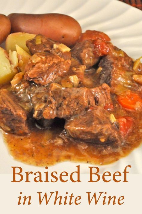 Braised Beef in White Wine. White gives a lighter flavor than red and is a typical Alsatian stew. With Carrots and Mushrooms #BeefStew #BeefWhiteWine #AlsatianStew #BraisedBeef White Wine Recipes, Beef And Vegetables, Cooking With White Wine, Wine Recipe, Beef Cheeks, Wine White, Braised Beef, French Cooking, Boiled Potatoes