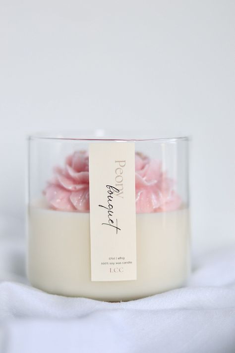 Experience the beauty of spring all year round with our Peony Bouquet candle. The delicate but bold scent of magnolia, peony, and freesia will transport you to a blooming garden. The clean and graceful finish of powder and wood notes will leave you feeling refreshed and inspired. - Reusable glass jar - Vegan Soy Wax - Toxin & Cruelty Free - Eco-friendly - Clean burning - Phthalate-Free Fragrance - Hand-poured - Lead-free cotton wicks Jar Candles Ideas, Unique Candle Containers, Floral Candles, Peony Candle, Flower Candles, Homemade Scented Candles, Sweet Candles, Candle Projects, Spring Candles