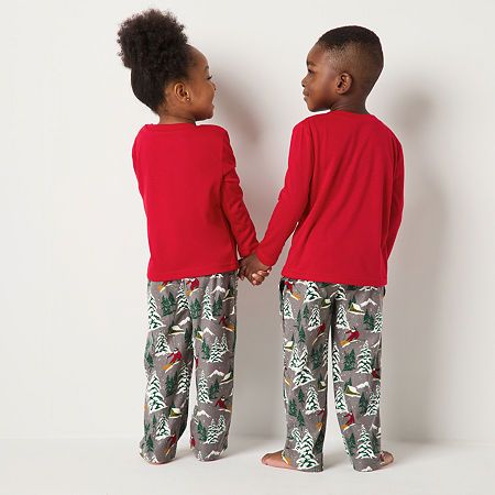 Your little ones will feel instantly cozy and festive in this Snowed Inn unisex toddler's pajama set by North Pole Trading Co. Made from soft jersey, it includes a graphic long-sleeve pajama top and coordinating printed drawstring pants. Wear it with fluffy socks or slippers. # Pieces In Set: 21st Piece Description: Top1st Piece Fabric: Jersey1st Piece Fiber Content: 100% Polyester1st Piece Care: Tumble Dry, Machine Wash2nd Piece Description: Pants2nd Piece Closure Type: Full Elastic2nd Piece P… Family Pajama Sets, Toddler Pajamas, Christmas Matching, Fluffy Socks, Christmas Pajama Set, Matching Family Pajamas, Kids Ideas, Family Pajamas, Printed Drawstring