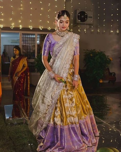 Leave a little sparkle where ever u go ✨ @sahaja93 looking graceful and elegant in our lustrous golden Kalidar lehenga. #parvathidasari… Langa Voni Half Saree, Half Sari, Pattu Lehenga, Half Saree Function, Langa Voni, Lehenga Saree Design, Half Saree Lehenga, Pattu Saree Blouse Designs, Long Gown Design