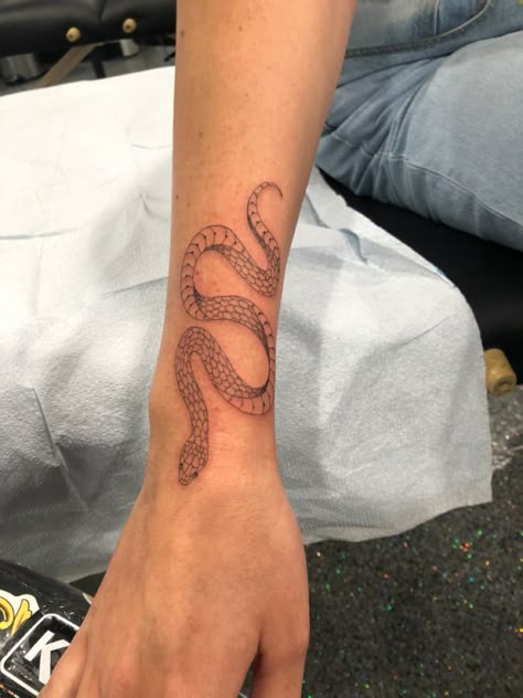 Fine line snake tattoo #snaketattoo #fineline #tattoosforwomen Side Snake Tattoos Women, Snake Tattoo Placement Arm, Snake Tattoo With Words, Fine Line Snake Tattoo Arm, Fine Line Snake Tattoo Design, Snake Tattoo Hand Women, Aesthetic Snake Tattoo, Unique Snake Tattoos For Women, Small Arm Snake Tattoo