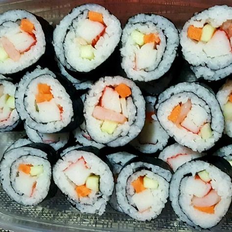 Cream Cheese and Crab Sushi Rolls Recipe | Allrecipes Crab And Cream Cheese, Crab Sushi, Sushi Recipes Homemade, Crab Rolls, Sushi Roll Recipes, Spicy Crab, Easy Sushi, Sushi At Home, Cheese Roll