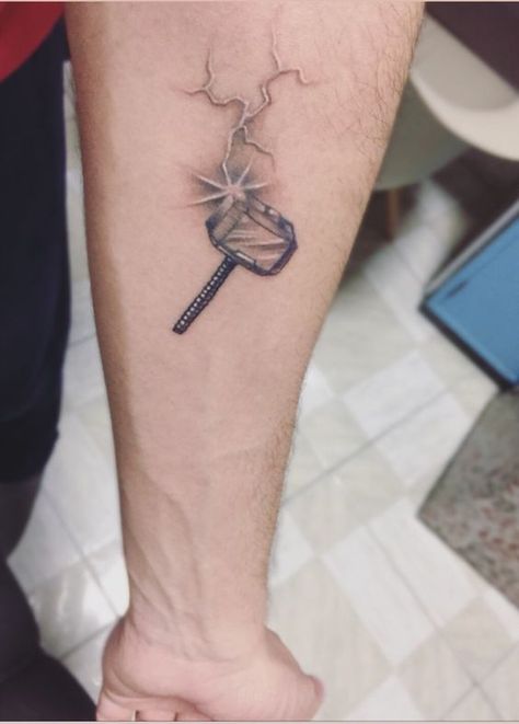 Thor's Hammer Tattoo, Small Thor Tattoo, Mjolnir Tattoo Marvel, Marvel Thor Tattoo, Thor Tattoo Ideas, Stormbreaker Tattoo, Thor Tattoo Marvel, Mjolnir Tattoo Design, Iron Man Tattoos