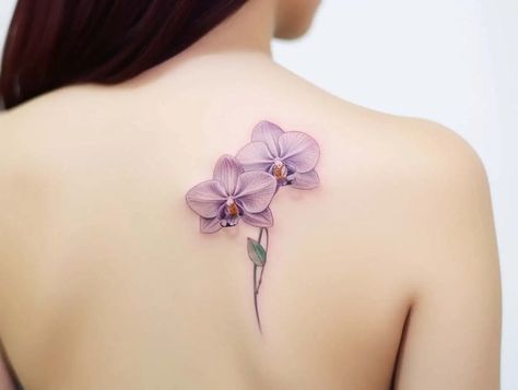 Orchid Tattoo Meaning: An Exploration and Designs Orchid Sunflower Tattoo, Fine Line Orchid Tattoo, Watercolor Orchid Tattoo, Orchid Tattoo Design, Purple Orchid Tattoo, Orchid Tattoo Meaning, Orchid Tattoos, Orchid Flower Tattoos, Beauty Confidence