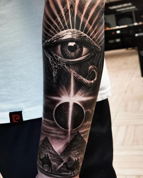 Realistic Eye of horus and Pyramid tattoo Eyes Back Tattoo, Eye Of Horus Pyramid Tattoo, Eye Of Horus And Anubis Tattoo, Eye Of Horus Tattoo Men, Annunaki Tattoo, Egypt Eye Tattoo, Anubis And Horus Tattoo, Horus Eye Tattoo, Pyramids Tattoo Design