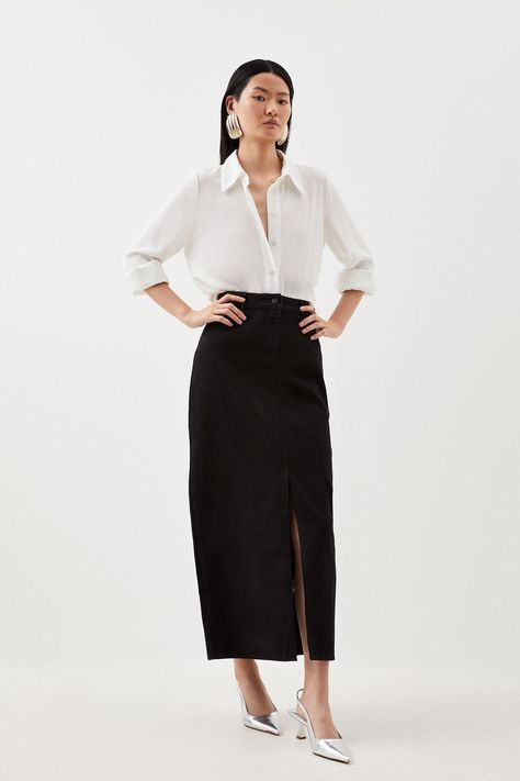 Reminiscent Of '90S Style, Yet Undeniably Fashion-Forward, This Denim Maxi Skirt Is A Wardrobe Essential For This Season And Next. Crafted With Light Wash Denim, This Piece Naturally Exudes An Off-Duty Mood. Elevate This Skirt With Heels And A Blouse For A Day-To-Evening Look, Or Pair With Trainers And A T-Shirt For An Effortless Everyday Outfit.Light Wash Denimfront Leg Slitfront And Back Pocketsbelt Loopsmaxi Hemline White Blouse Black Skirt Outfit, Office Look Skirt, Maxi Skirt Office Outfit, Black Midi Skirt Outfit Work, Black Maxi Skirt Outfit For Work, Maxi Pencil Skirt Outfit, Black Denim Maxi Skirt Outfit, Maxi Skirt Work Outfit, Skirt And Shirt Outfits