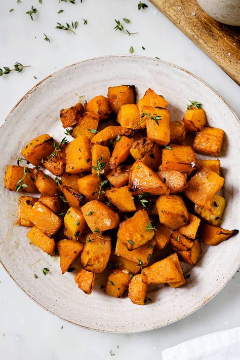 A serving platter of air fryer butternut squash garnished with thyme. Butternut Squash Recipes Roasted Air Fryer, Air Fry Butternut Squash Recipes, Butter Ut Squash Recipes Air Fryer, Air Fried Butternut Squash, Air Fry Butternut Squash, Beet Orange Salad, Air Fryer Squash, Air Fryer Cod Recipe, Air Fryer Cod