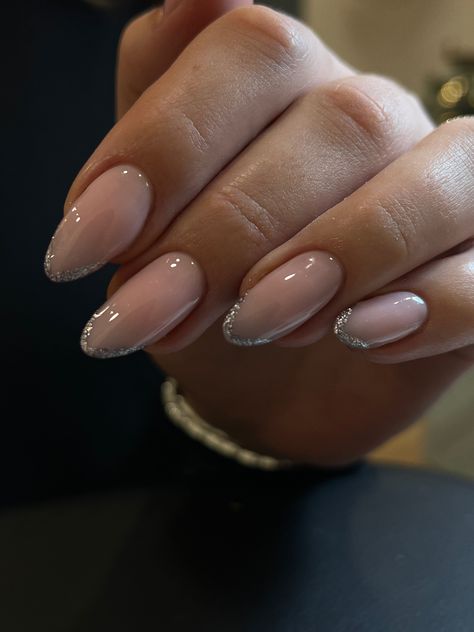 New Years Nails French Tip Almond, French Nails With Silver Tips, Christmas Nails Sparkly Silver Glitter, French Gliterry Nails, Nails With Glitter At Cuticle, Christmas Nails Glitter Tips, Glittery Tips Nails, Sparkling French Tip Nails, Shimmery French Tip Nails