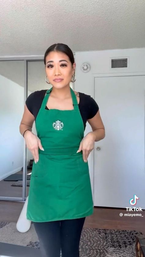 Starbucks Outfits Barista, Starbucks Apron Pins, Starbucks Uniform Ideas, Barista Outfit Starbucks, Barista Hairstyles Starbucks, Starbucks Green Apron Board, Starbucks Worker Aesthetic, Starbucks Barista Costume, Starbucks Outfit Barista