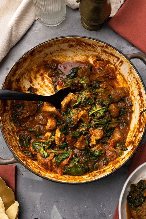 This comforting lamb saag recipe is absolutely packed full of flavor. Chunks of lamb shoulder are browned and then stewed in a highly fragrant mixture of spices and vegetables, until the lamb is so wonderfully tender and succulent it could be cut with a spoon. #lamb #saag Lamb Saag Recipe, Lamb Saag, Saag Recipe, Hearty Stew, Lamb Shoulder, Hearty Stews, The Lamb, Tasting Table, Curry Paste