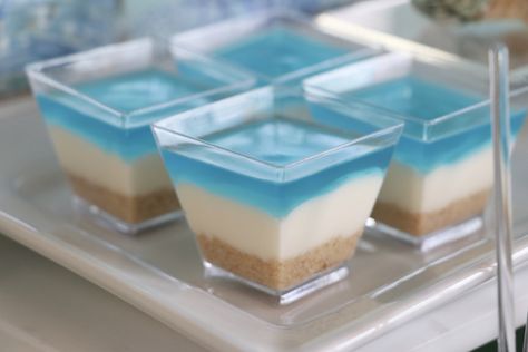 These white chocolate mousse cups with shortbread crumbs will make the perfect addition to any beach themed party! Beach Themed 40th Birthday Party, Coastal Beach Party Theme, Ocean Theme Deserts, Beach Themed 21st Birthday, Ocean Inspired Desserts, Disney Beach Party, Ocean Themed Brunch, Beach Jello Cups, Under The Sea Theme Desserts