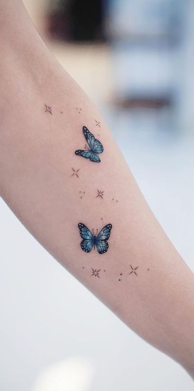 Wrist Tattoos Butterfly, Meaning Of Butterflies, Tattoo Designs Butterfly, Realistic Butterfly Tattoo, Purple Butterfly Tattoo, Colorful Butterfly Tattoo, Monarch Butterfly Tattoo, Blue Butterfly Tattoo, Wrist Tattoo Cover Up