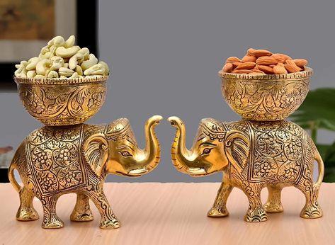 Looking for a unique centerpiece for your living room? These golden elephant figurines are just what you need!💓 We have two in two colors golden as well as silver Available 🐘🐘 Dm us for more information 🤠 #goldenelephantfigurine #silverelephantfigurine #uniquecenterpiece #BrassdaddyMetalElephantBowl #luxuriousoasis #functionalbeauty #essenceofelegance #onlineshopping #sanskritiartsindia Urli Bowl, Royal Elephant, Golden Elephant, Metal Elephant, Brass Elephant, Home Office Table, Best Housewarming Gifts, Dry Fruit, Marriage Gifts