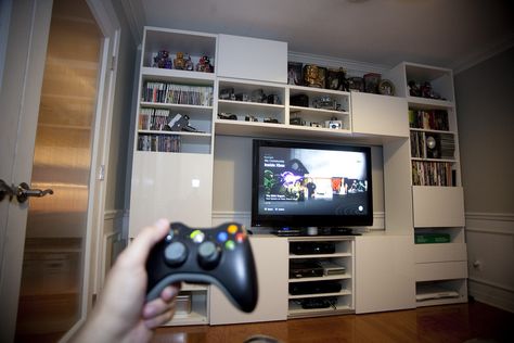 Video Game Room Wall - TV and Console Shelves - Ikea Besta Entertainment Center via littlelostrobot on Flickr Besta Entertainment Center, Video Game Room Ideas, Gaming Entertainment Center, Video Game Storage, Console Display, Game Room Ideas, Gaming Lounge, Basement Games, Nerd Room