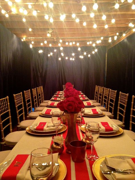 Bring those patio lights inside and add some twinkle to your party! This dinner was actually in an unfinished basement. We draped walls in navy fabric to keep the party dark and romantic and added string globe lights to the ceiling to take away from the raw wooden beams. Basement Dinner Party, Draped Walls, Basement Party, Unfinished Basements, Basement Ceiling Insulation, Unfinished Basement Walls, Basement Ceiling Ideas Cheap, Grinchmas Party, Small Basement Design