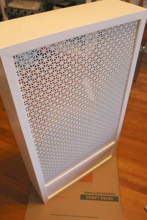 How to Build a Radiator Cover | Hunker Heater Cover Ideas, Heater Cover Diy, Wall Heater Cover, Diy Radiator Cover, Diy Heater, Radiator Covers, Small Bedroom Storage, Garden Apartment, Fireplace Cover