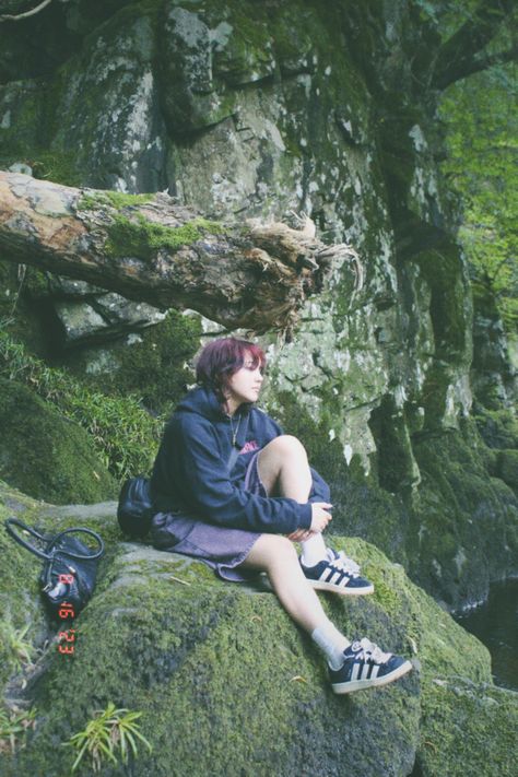 Photography of mountains | sitting by the river Sitting On A Cliff Pose, People Outside Photography, Person Sitting Looking Up Reference, Sitting Down Photography, Sitting Back Turned Pose, Sitting Casual Pose, Person Sitting With Knees To Chest, Human Poses Reference Sitting, Sitting On Rock Pose Reference