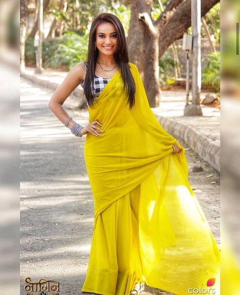 319 Likes, 2 Comments - Surbhi Jyoti Fanpage (@surbhijyoti_my_shiningstar) on Instagram: “Sexy curves and hot navel….😍😍 Yellow suits you best my sona pie 💛😘 . . @surbhijyoti #surbhijyoti…” Sarees For Girls, Surbhi Jyoti, Cotton Blouse Design, Saree Wearing, Simple Saree Designs, Indian Sari Dress, Sari Dress, Simple Sarees, Indian Photoshoot