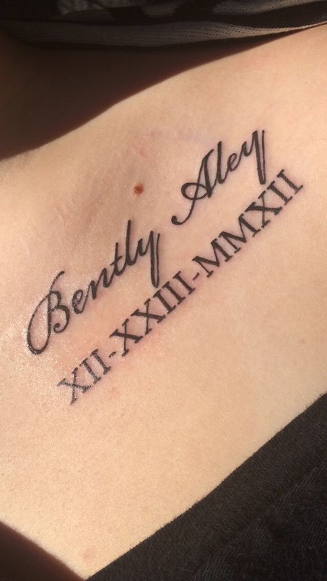 Name and birthday in Roman numerals tattoo Tato Nama, Roman Numbers Tattoo, Married Couple Tattoos, Tattoo Name Fonts, Numbers Tattoo, Font Tato, Baby Name Tattoos, Tattoo Fonts Cursive, Roman Numeral Tattoos