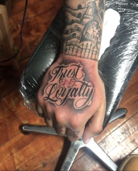 Trust N Loyalty Tattoo Hand, Loyalty Rose Tattoo, Hand Qoute Tattoo, Trust N Loyalty Tattoo, Trust And Loyalty Tattoos, Chest Tattoo Men Ideas One Side, Loyalty Hand Tattoos For Guys, Hand Tattoos Cute, Get Rich Or Die Trying Tattoo