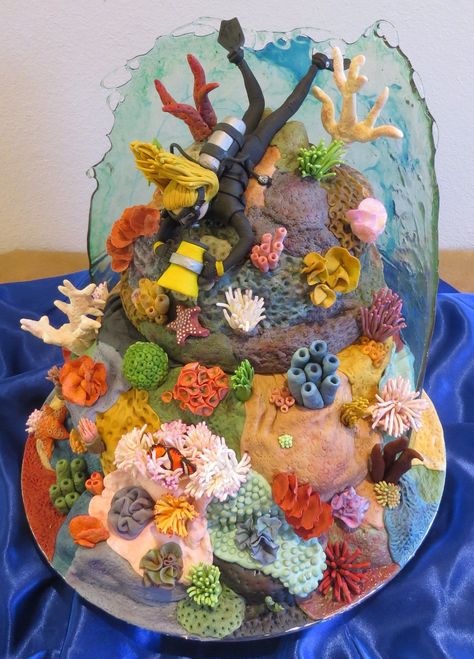 Scuba Diving Coral Reef Cake With Working Dive Light And Edible Glass Water Vanilla Buttercream cake covered in fondant live rock to make... Coral Reef Cake, Reef Cake, Scuba Cake, Aquarium Cake, Vanilla Buttercream Cake, Ocean Cakes, Diy Edible, Shark Cake, Sea Cakes