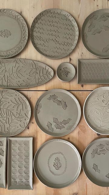 Hanna Lühl on Instagram: "This Is How I make my stamped plates. I don’t have a slap roller so I use a laundry mangle. For the right thickness of my rolled out clay, I use wooden strips in the wanted height. The stamps I have got are from different places. I’m always on the lookout for new ones. #ceramicplates #keramikteller #keramik #stempel #handbuilding #woodenstamps #handbuild #aufbautechnik #stampedinclay #stampedclay #stamping #stempelinton #töpfern #potteryforall #CREmerging #ihavethi Diy Ceramic Stamps, Slap Pottery, Hand Built Plates, Ceramic Stamps How To Make, Stamped Clay Bowls, Clay Stamp Designs, Clay Stamps For Pottery Diy, Stamp Ceramic, Minimal Ceramics