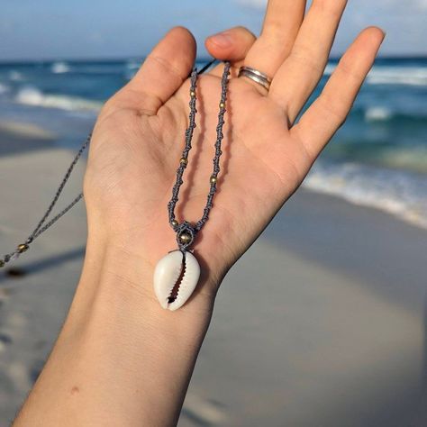 🌊✨ New Favorite! ✨🌊 Adorable cowrie shell necklace, perfect for that beachy vibe. ���🐚💖 #MacrameNecklace #CowrieShell #HandmadeWithLove #cozyjewelry 🦋 #MacrameJewelry #HandmadeJewelry #BohoJewelry #Knotting #MicroMacrame #handmadejewelry #jewelry #macrame #necklace #crystaljewelry #necklace #jewellery #artjewellery #bracelets #macrameart #handmade #macramelove Macrame Shell, Cowrie Shell Necklace, Edgy Jewelry, Mini Macrame, Micro Macramé, Macrame Art, Belly Chain, Macrame Necklace, Shell Necklace