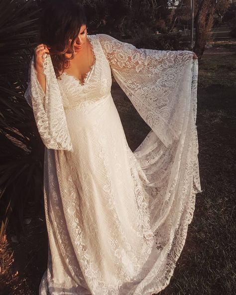 Bohemian romantic blush plus size wedding dress with gorgeous bell sleeves, long train and the softest French lace ever! More of Studio Levana gowns here>>> Sleeve Wedding Dress Plus Size, Long Sleeve Bohemian Wedding Dress, Wedding Dresses For Curvy Women, Bell Sleeve Wedding Dress, Boho Wedding Dress Bohemian, Wedding Dresses Whimsical, Plus Wedding Dresses, Wedding Dress Plus Size, Wedding Dresses Hippie