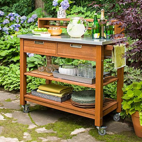 Repurpose a potting bench as a food and beverage cart. Mobile and weather-resistant, this cart makes entertaining outdoors simple and stylish. Potting Bench Ideas, Potting Bench Plans, Outdoor Potting Bench, Diy Outdoor Bar, Slatted Shelves, Potting Tables, Potting Table, Bali Hai, Outdoor Kitchen Appliances