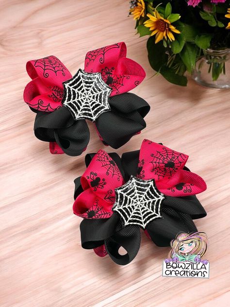 Spooky season is upon us! Check out these spider web ribbon pigtail bows! They are perfect for all of the Halloween festivities! Look at that GLOW!  ** A little about the bow: **  - Ribbon, stacked. feltie center (they GLOW)  - Bow measures approx. 3.5 inches across  - Attached and secured to an alligator clip  - ALL Bowzilla bows are handfolded/glued/assembled, size and variation may vary slightly.  ** A little about us: ** - All of our bows are made with the best/high quality material and glitters that do not shed. - Smoke free, pet and kid friendly home. - Bowzilla Creations strives to bring hand crafted, high quality hair bows to each and every little girl! We want every little girl to know they are a princess! - Due to color variations in different screens, the color may slightly vary Kid Friendly Home, Bow Inspiration, Pigtail Hair Bows, Hair Bows For Girls, Halloween Hair Bows, Pigtail Bows, Bows For Girls, Halloween 3, Halloween Festivities