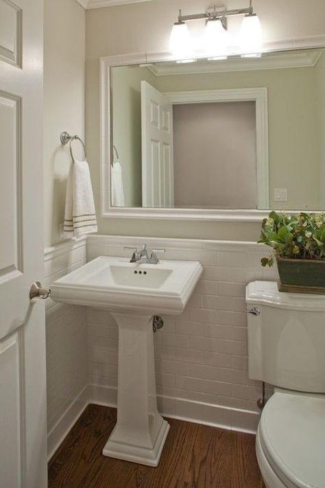 Traditional Powder Room with Oak Hardwood Floor, Kichler lighting uptown 3 light bathroom light, Crown molding, Pedestal Sink Half Bathroom Storage Ideas, Budget Powder Room, Chic Powder Room, Traditional Powder Room, Makeover Kamar Mandi, Beautiful Bathroom Designs, Toilet Sink, Powder Room Design, Pedestal Sink