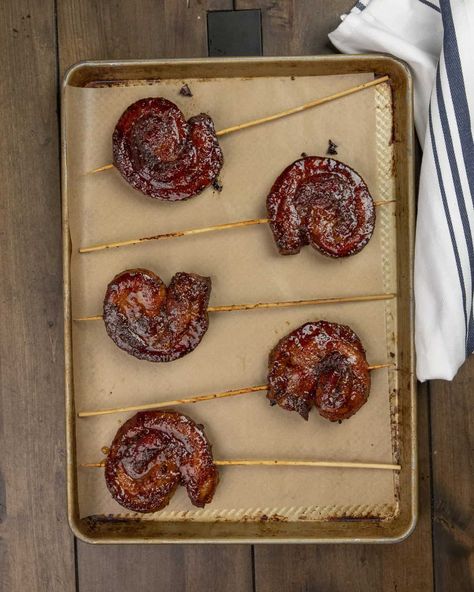 Meat candy on a stick! These smoked pork belly pinwheels with maple bourbon glaze are sweet, sticky, and down right delicious. Candy On A Stick, Bacon Jam Burger, Maple Bourbon Glaze, Smoked Pork Belly, Picnic Roast, Meat Candy, Bourbon Glaze, Barbeque Recipes, Appetizer Sandwiches