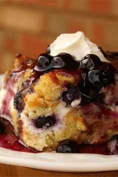 Overnight Blueberry French Toast | "Good for any holiday breakfast or brunch, it's filled with the fresh taste of blueberries, and covered with a rich blueberry sauce to make it one of a kind." #holidays #holidayrecipes #holidayseason #holidayfood #allrecipes Blueberry French Toast Casserole, Pizza Vegana, Nutella Desserts, Blueberry French Toast, Breakfast And Brunch, Overnight Blueberry French Toast, Holiday Breakfast, What's For Breakfast, French Toast Casserole