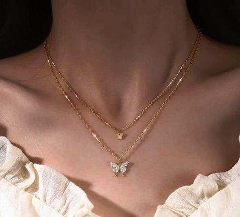 • Material: Alloy • Color: Gold Plated Chain • Pendant: Butterfly • Unique Korean Design • Keep Away From Dust And Moist • Double Chain Style • For Party Wear #aesthetic #ａｅｓｔｈｅｔｉｃ #jwellery #necklace #koreanjewelry #aestheticjewelry #elegantjewelry #HandcraftedJewels #JewelryObsession #JewelryInspiration #explorepage #pintrestjwellery #pintrestjwelleryvibes Korean Jwellery Aesthetic, Korean Chain Necklace, Korean Jwellery, Style For Party, Butterfly Unique, Pendant Butterfly, Chains Aesthetic, Cute Promise Rings, Simple Butterfly