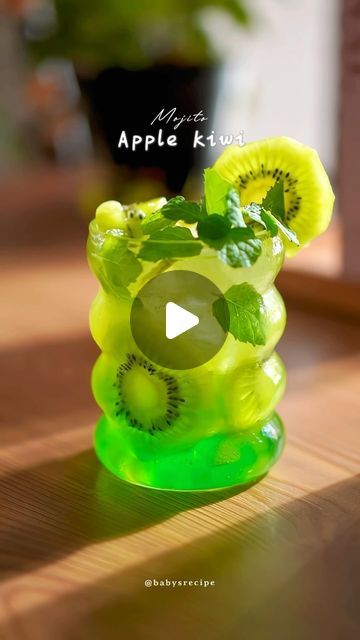 Baby's Homecafe & cook on Instagram: "(Asmr) Apple Kiwi Mojito
When I speak of end of summer, hydration comes to my mind! It’s all about beating the heat with refreshing summer drinks and staying hydrated 24x7!

This kiwi mojito is super yummy, tangy, refreshing and minty drink!

Ingredients:
10ml green apple syrup
Coconut juice + coconut jelly

Kiwi
15ml kiwi syrup 
Mint leaves 
Freshly squeezed lime juices 
Sparkling Water
Squashed and strained 

Ice cubes 
kiwi slices 
Mint leaves 
Garnish

#refreshingdrink #japanesevibes #ghiblivibes #homecafe #easyrecipe #mocktail #lemonade  #cute #thirsty #cinematic #calmvibes #metime #cocktail #mojito #summerdrink #asmr 
#kiwi #apple #resepminuman" Mocktail Lemonade, Kiwi Syrup, Kiwi Mojito, Apple Syrup, Creative Drinks, Drink Ingredients, Juice Coconut, Coconut Juice, Coconut Jelly